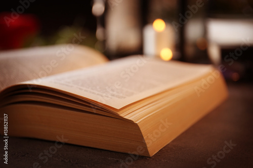 Close up view of open Bible on table © Africa Studio
