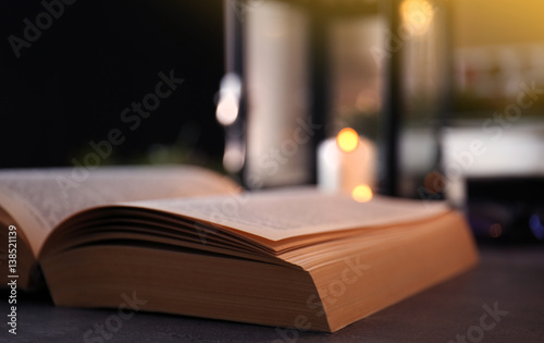 Close up view of open Bible on table