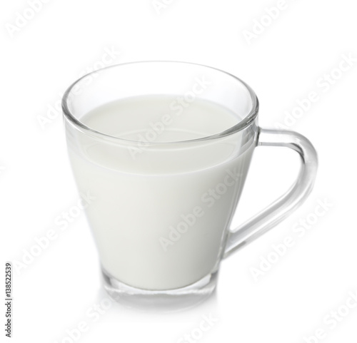 Cup of tasty milk on white background