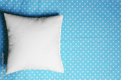 Blank soft pillow on color background