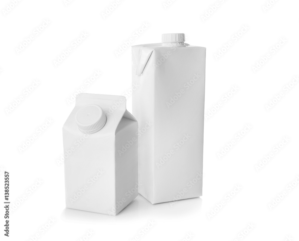 Two simple milk boxes on white background Two simple milk boxes on white background