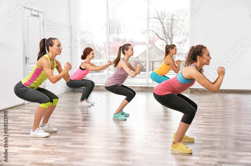 Beautiful girls training in gym