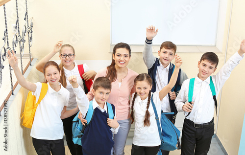 Teacher with children in sc...