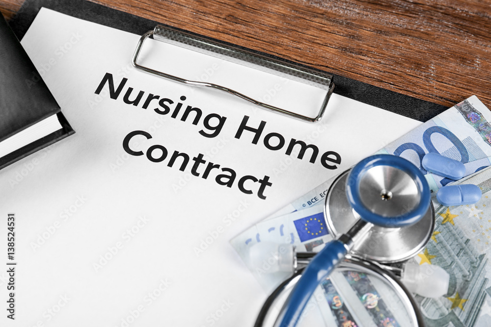 Nursing Home Contract on clipboard, closeup. Medical concept Nursing Home Contract on clipboard, closeup. Medical concept