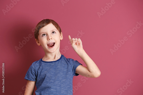 Cute little boy with index ...