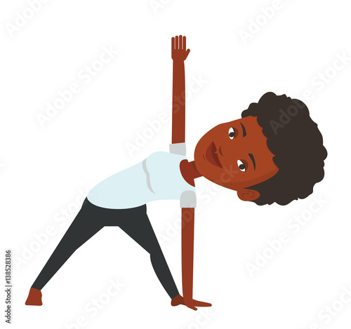 Woman practicing yoga triangle pose.