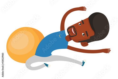 Young man exercising with fitball.