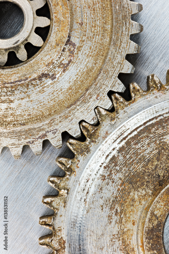 old gears with rust on scratched industrial background macro old gears with rust on scratched industrial background macro
