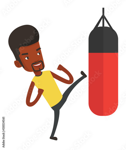 Man exercising with punching bag.