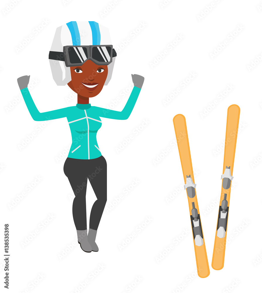 Fotografie Cheerful skier standing with raised hands
