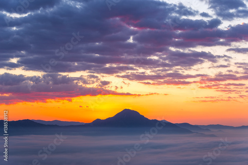 Sunrise and fog over Phu Thok Mountain at Chiang Khan ,Loei Province in Thailand.