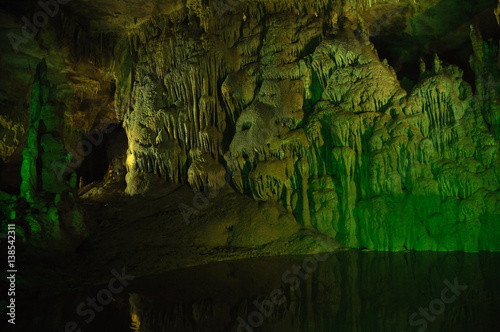 Prometheus Cave. Georgia. Stalactites and stalagmites highlighted colors.