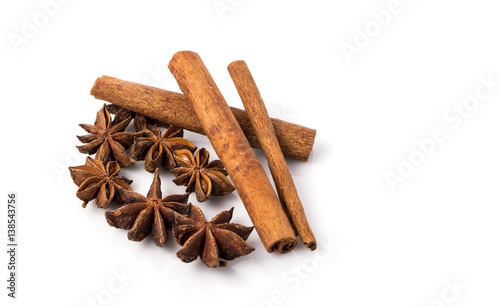 Fragrant anise and cinnamon isolated on white background