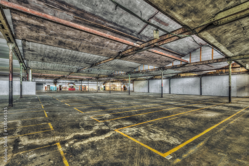 Empty warehouse in an abandoned factory Empty warehouse in an abandoned factory