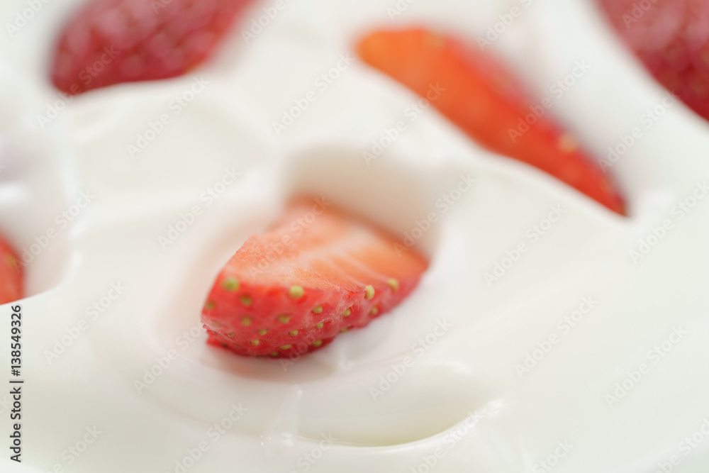macro photo of organic yogurt with fresh sliced strawberries, food background macro photo of organic yogurt with fresh sliced strawberries, food background