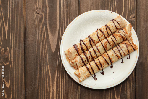 Rolled crepes with chocolate