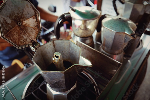 moka pot Italian traditional coffee maker with hot coffee