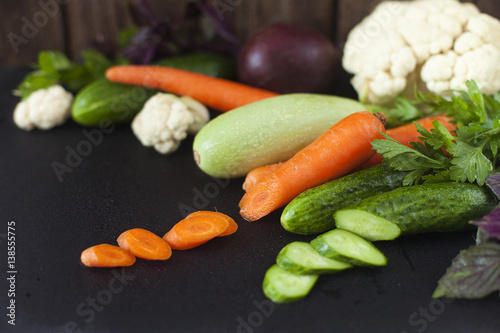 fresh vegetables on rustic background with copy space
