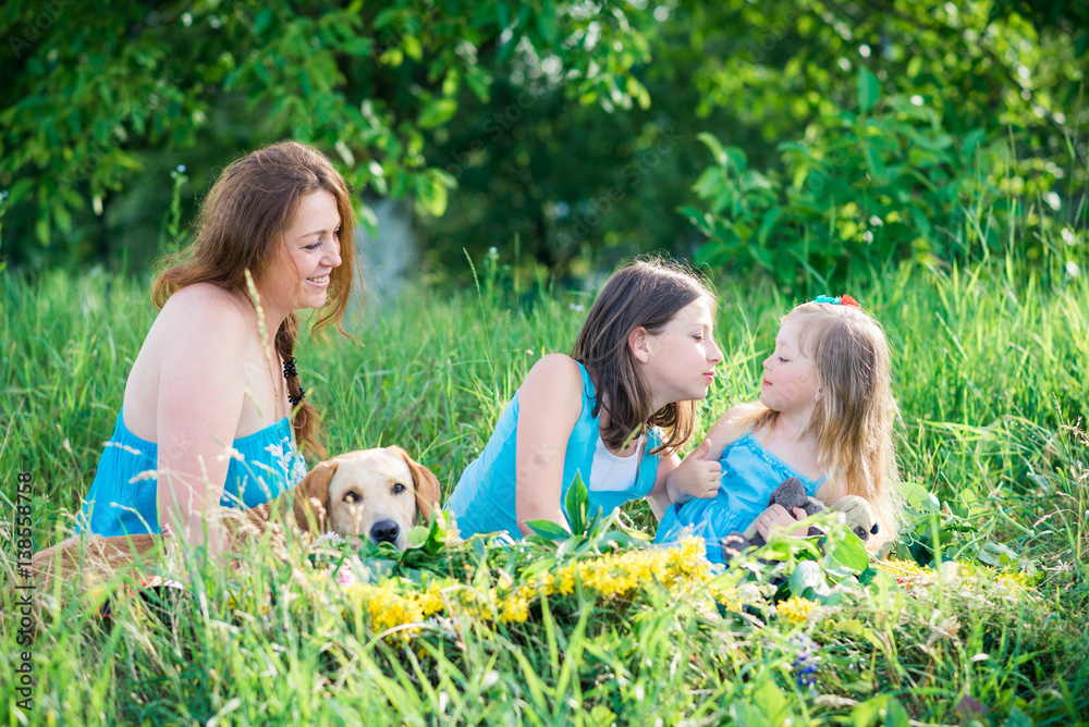 mother, two daughters and dog mother, two daughters and dog