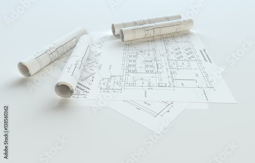Rolled House Blueprints On Gray Background