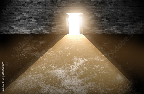 Wood doors opening with old cement wall and light coming in. background of old vintage white brick.