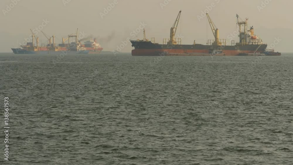 Cargo ships float in the sea. Asia. Vietnam. Cargo ships float in the sea. Asia. Vietnam.