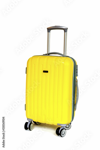 Travel yellow bag on white background.