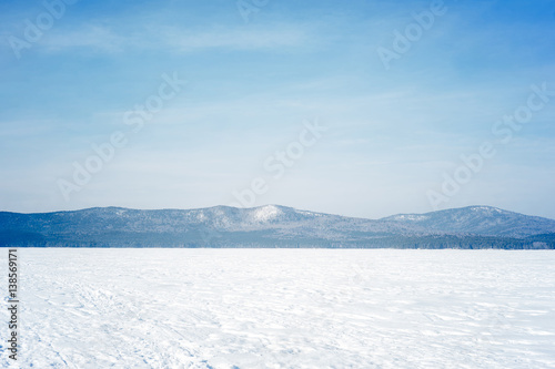 landscape of a frozen mountain lake © Nichizhenova Elena