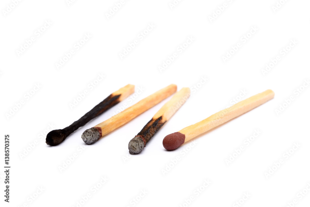 Laid used matchsticks isolated on white background Laid used matchsticks isolated on white background