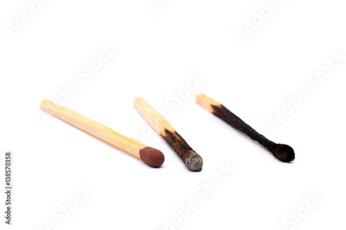 Laid used matchsticks isolated on white background 