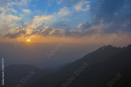 Beautiful scenery landscape sunrise view from top of mountain at Chiangmai province in Thailand , popular for photographers and tourists. Attractions and natural Concept