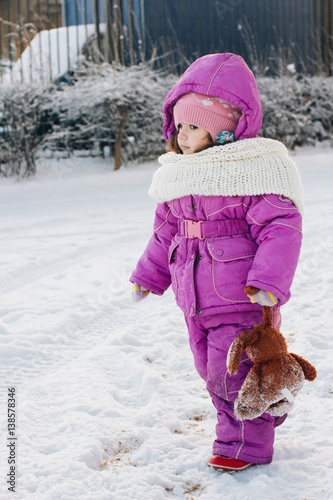Baby girl walking on winter...