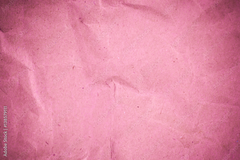 Fototapeta premium Pink crumpled recycle paper background.