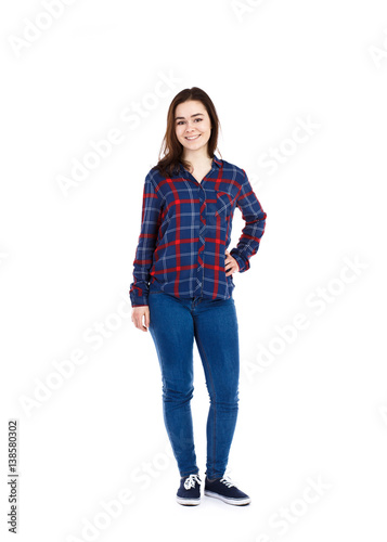 Young woman standing on white background 