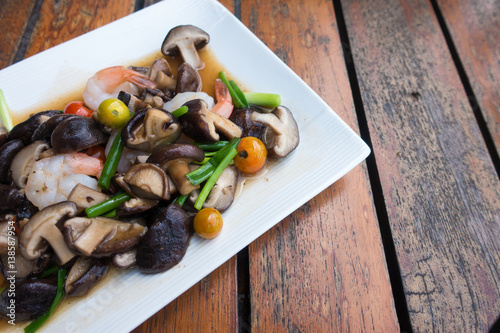 close up mushroom fried with shrimps.healthy food photo