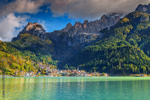 Amazing alpine village and lake in Dolomites mountains, Alleghe, Italy