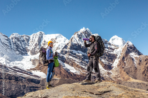 People on Hike in high Mountains stay and relax