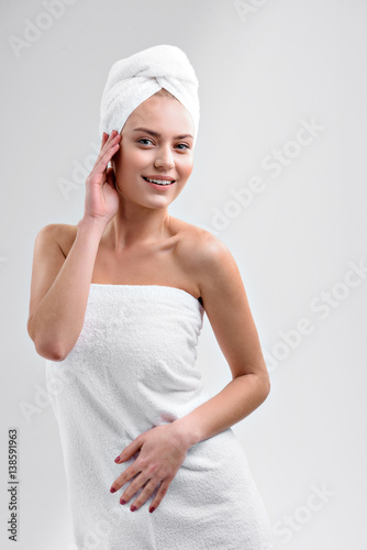 Cheerful girl is satisfied with hygiene product