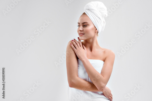 Carefree woman enjoying skincare treatment