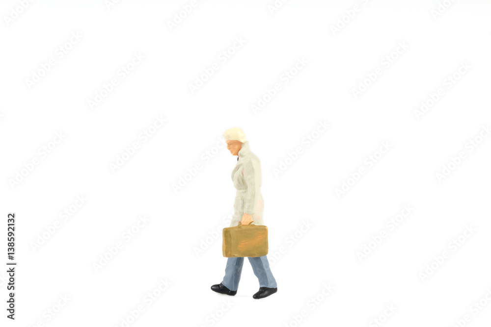 Miniature people businessman on background with a space for text