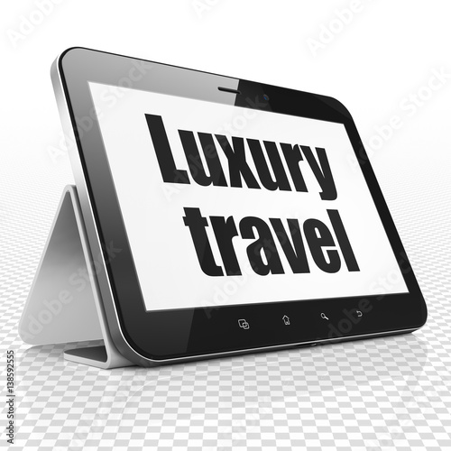 Vacation concept: Tablet Computer with Luxury Travel on display