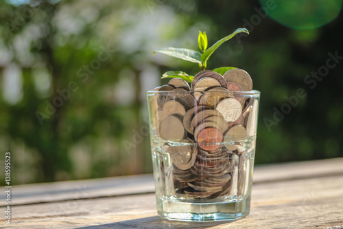 Saving money with interest to the future.