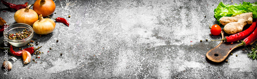 Fotografie Fresh spices. Aromatic spices on a rustic background.