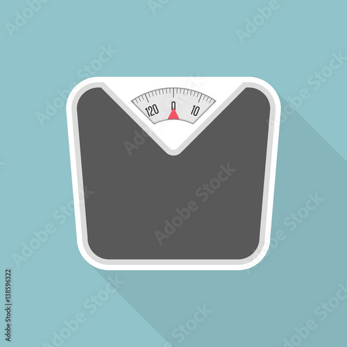 Weight scale with long shadow.