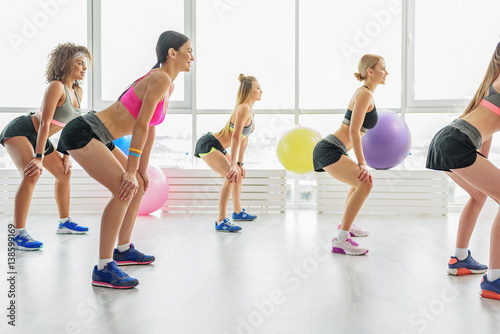 Slim active girls in gym