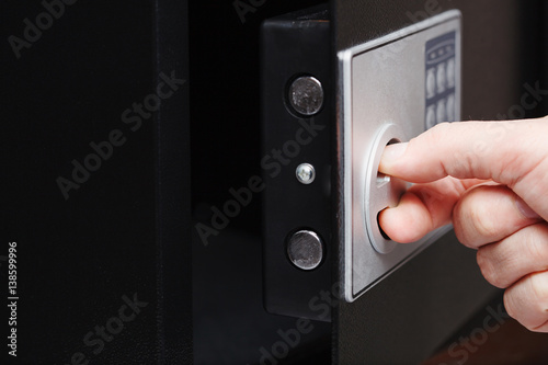 man hand opened a safe, close up