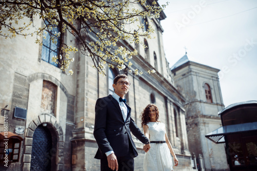 happy and loving couple walking and make photo in the old city