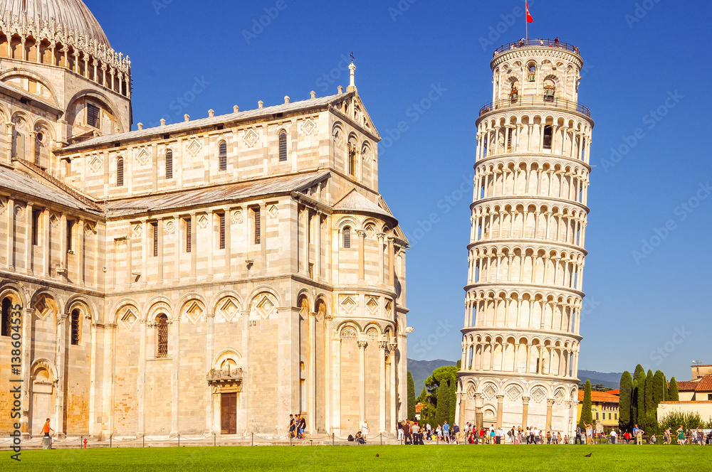 Pisa, Italy - 9 September 2011: Tourists admire the cathedral an