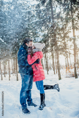 Guy and girl walk ,have fun in the forest in winter © Dmitriy Shipilov