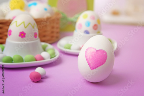 Easter egg and candies on c...
